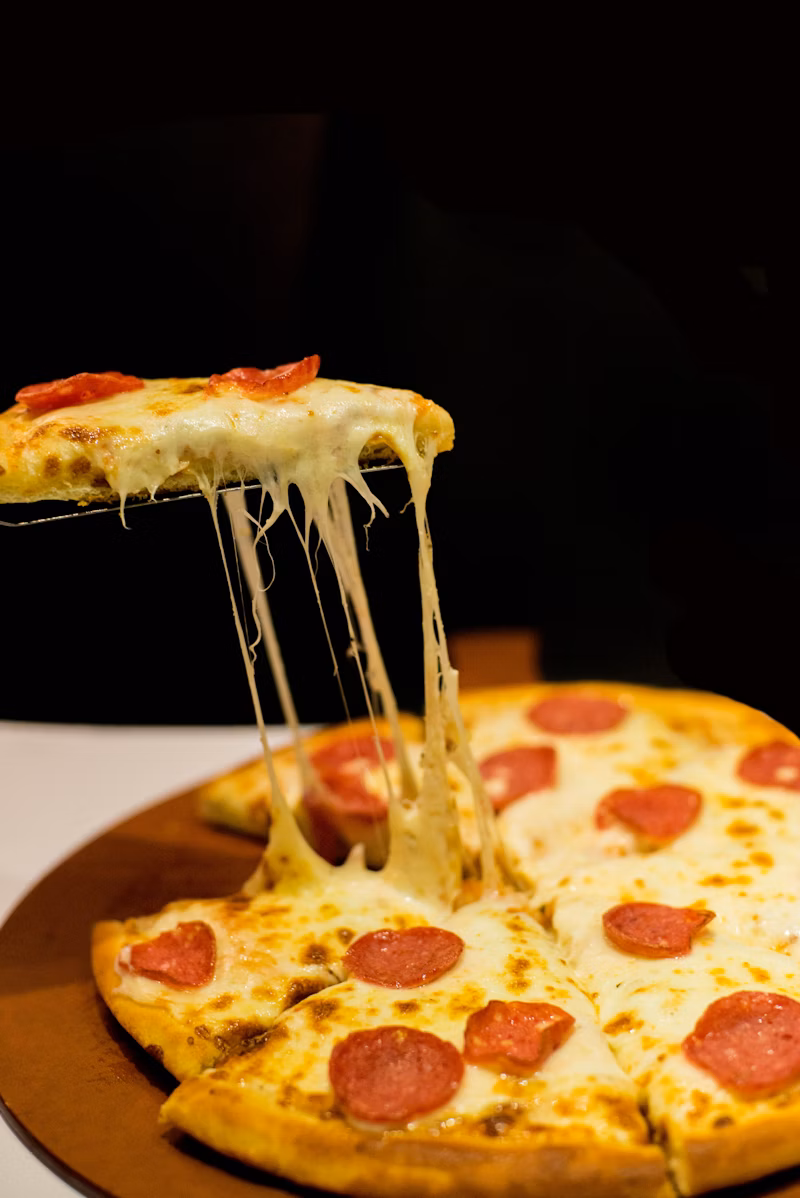 Beautifully arranged assorted appetizers served on a rustic wooden platter