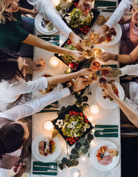 Elegant dining table setup with fine cutlery and candles